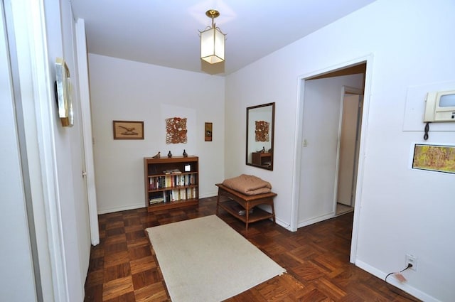 hall with dark parquet floors