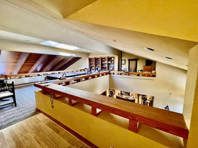 6 Hidden Pond, Muttontown, NY 11545 - bar with vaulted ceiling and wood finished floors
