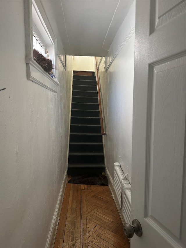 corridor featuring parquet floors