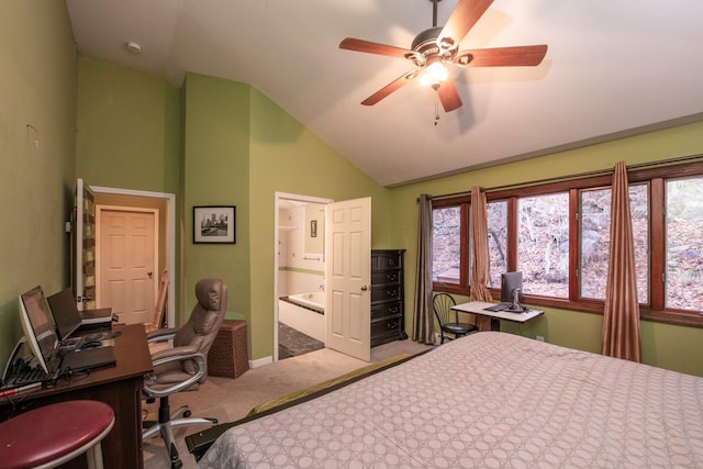 carpeted bedroom with ceiling fan and vaulted ceiling