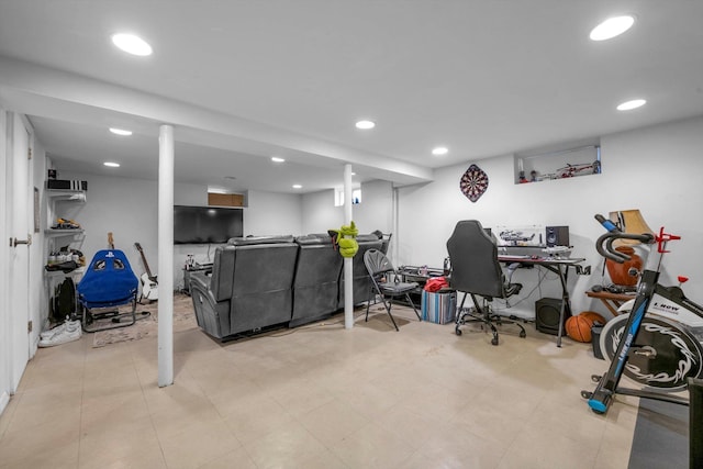 home office featuring light floors and recessed lighting