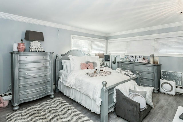 bedroom featuring dark hardwood / wood-style flooring and crown molding