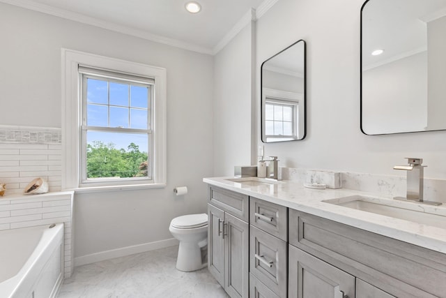 bathroom featuring a tub to relax in, vanity, toilet, and ornamental molding