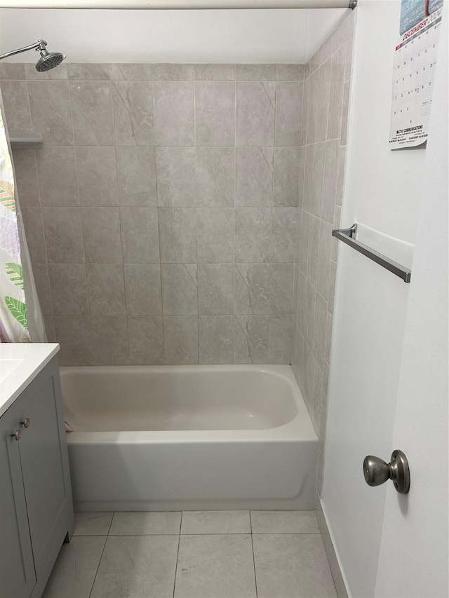 bathroom with vanity, shower / tub combo, and tile patterned flooring