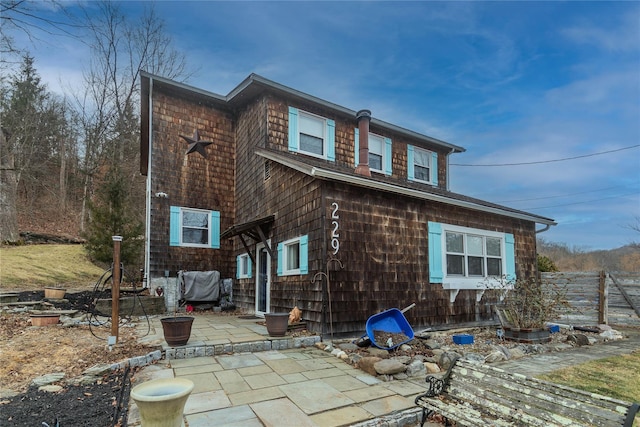 back of house featuring a patio