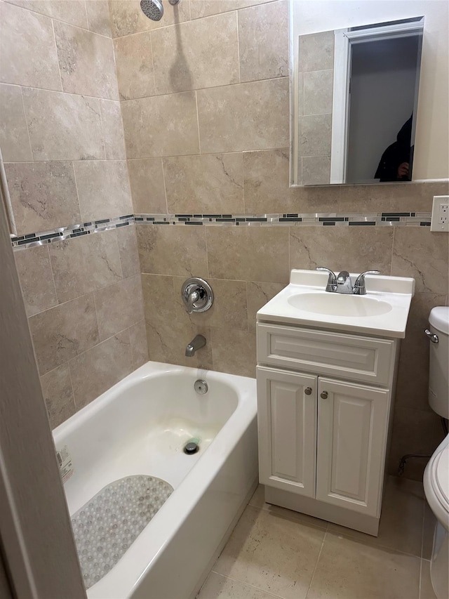 bathroom with toilet, shower / tub combination, tasteful backsplash, and vanity