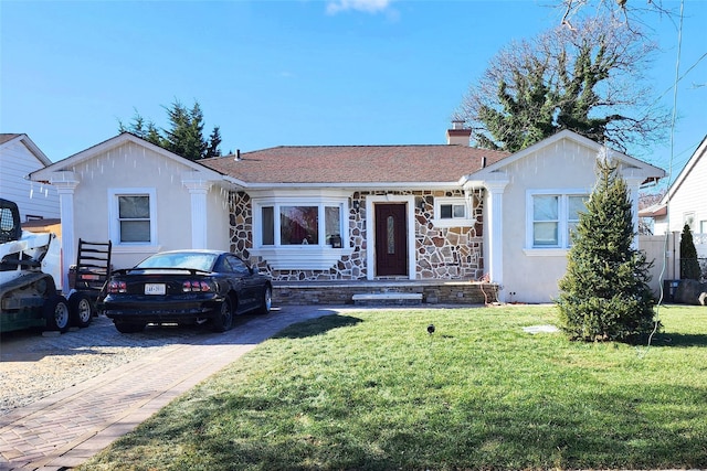 view of front of home with a front lawn