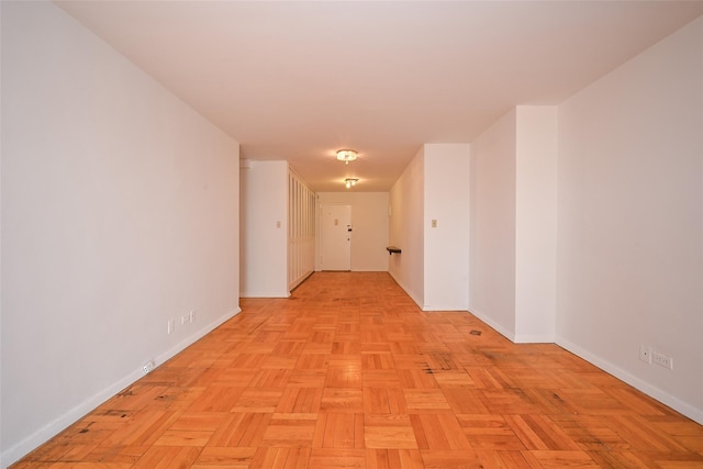 hallway with light parquet flooring