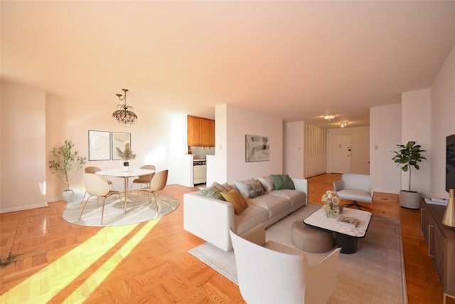 living room with light parquet floors and a chandelier