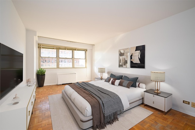 bedroom featuring parquet floors