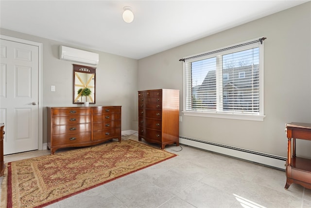 bedroom featuring an AC wall unit and a baseboard heating unit