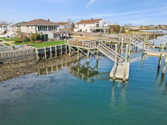 dock area with a water view