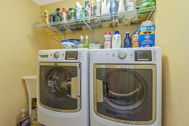 washroom featuring independent washer and dryer