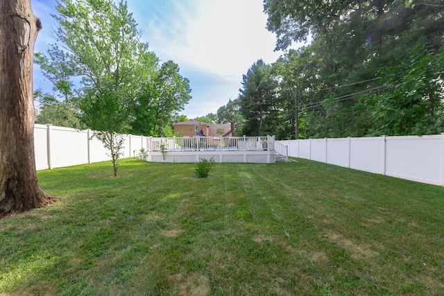 view of yard featuring a deck