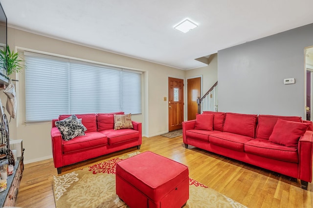 living room with light hardwood / wood-style floors