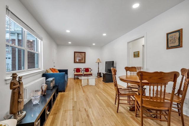 dining area with light hardwood / wood-style floors