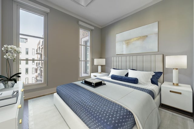 bedroom with ornamental molding and light wood-type flooring