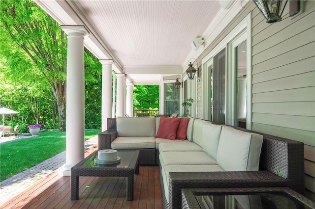 view of patio with an outdoor living space and covered porch