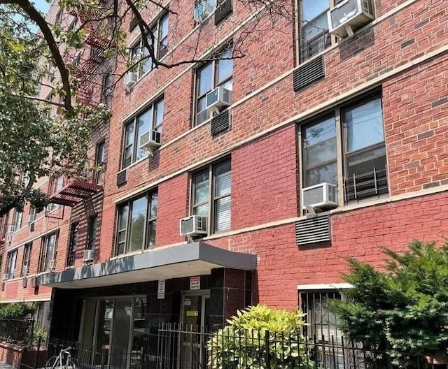 view of building exterior featuring cooling unit