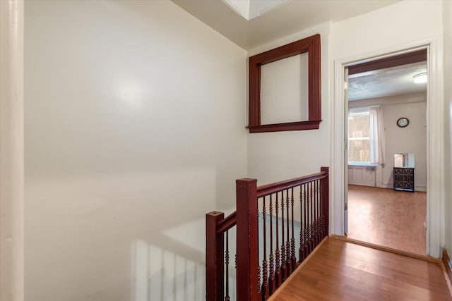 hallway featuring hardwood / wood-style floors