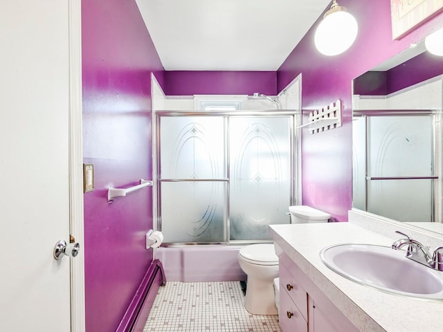 full bathroom with baseboard heating, tile patterned flooring, enclosed tub / shower combo, toilet, and vanity