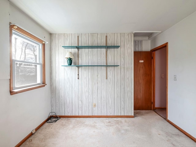 empty room featuring light colored carpet