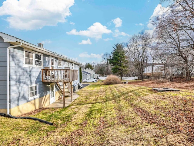 view of yard featuring a deck