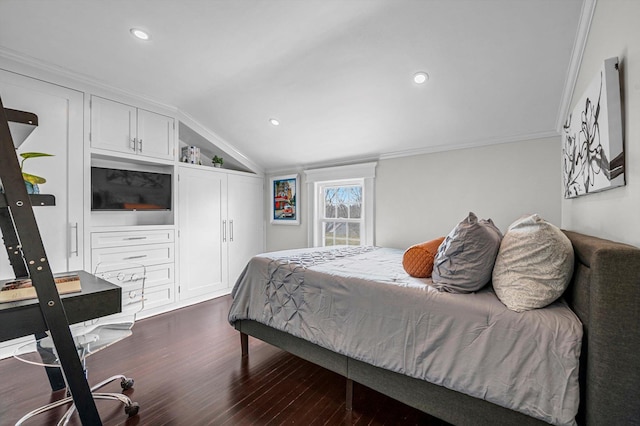 bedroom with vaulted ceiling, ornamental molding, and dark hardwood / wood-style floors