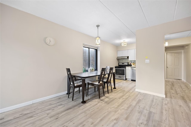 dining room featuring light wood-type flooring