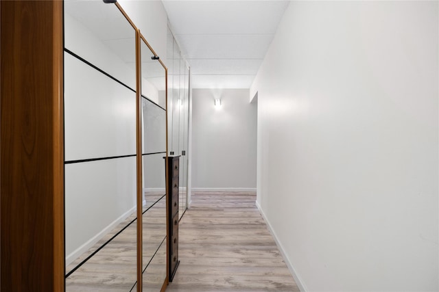 corridor featuring light hardwood / wood-style flooring