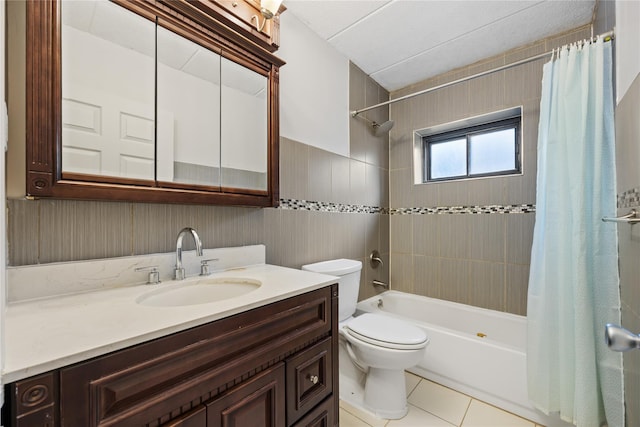 full bathroom with vanity, tile patterned floors, shower / bath combination with curtain, and toilet