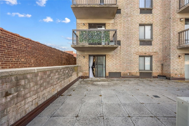 rear view of house featuring a patio area