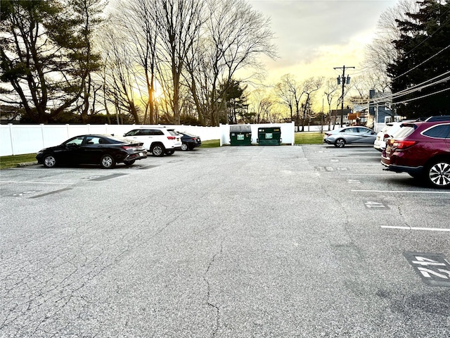 view of parking at dusk