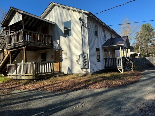 view of home's exterior with a deck