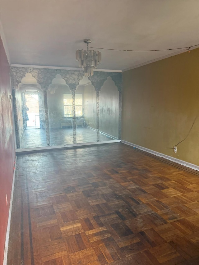 spare room with dark parquet floors