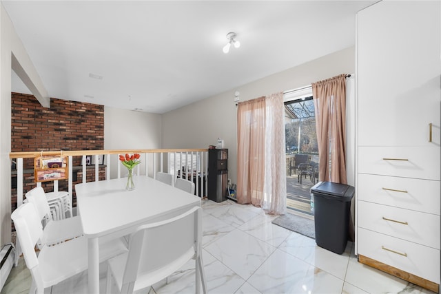 dining room featuring baseboard heating