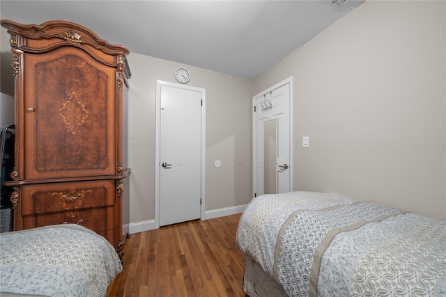 bedroom featuring hardwood / wood-style flooring