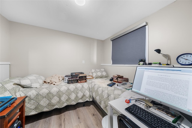 bedroom featuring hardwood / wood-style floors