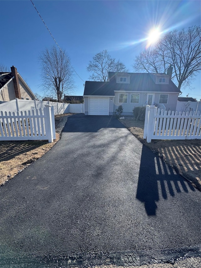 view of front of property with a garage