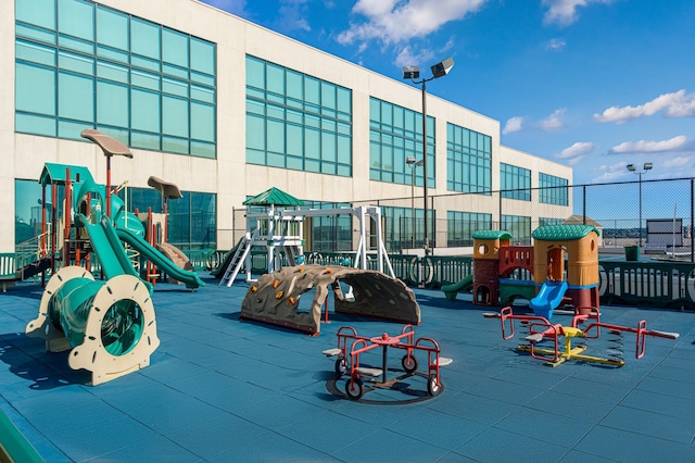 community play area featuring fence