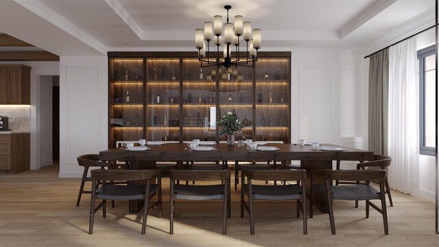LOT11003 Baldwin Path, Dix Hills, NY 11746 - dining space featuring an inviting chandelier, a tray ceiling, light hardwood / wood-style flooring, and crown molding