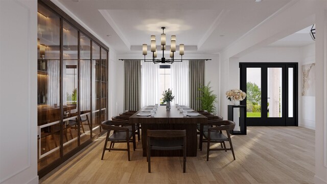 LOT11003 Baldwin Path, Dix Hills, NY 11746 - dining space with a raised ceiling, a chandelier, and light wood-type flooring