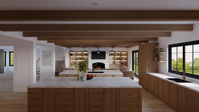LOT11003 Baldwin Path, Dix Hills, NY 11746 - kitchen featuring a large fireplace, a healthy amount of sunlight, sink, and a kitchen island