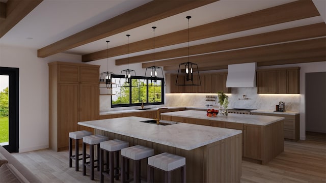 LOT11003 Baldwin Path, Dix Hills, NY 11746 - kitchen featuring a kitchen island, tasteful backsplash, hanging light fixtures, beam ceiling, and wall chimney exhaust hood