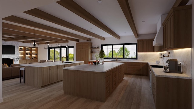 LOT11003 Baldwin Path, Dix Hills, NY 11746 - kitchen with a center island, open floor plan, tasteful backsplash, light wood-style floors, and beamed ceiling
