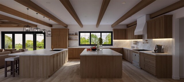 LOT11003 Baldwin Path, Dix Hills, NY 11746 - kitchen featuring sink, hanging light fixtures, an island with sink, high end white range, and wall chimney range hood