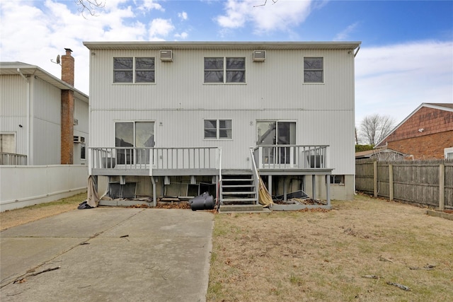 rear view of property with a deck