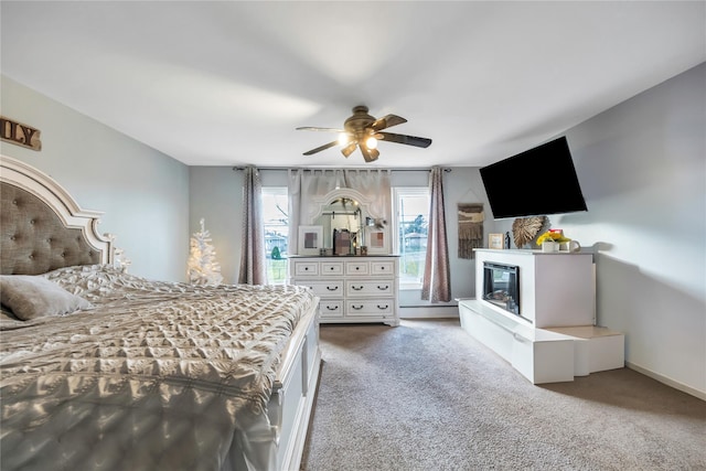 unfurnished bedroom featuring carpet and ceiling fan