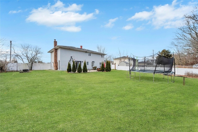 view of yard featuring a trampoline