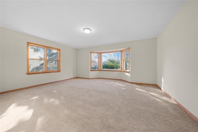 view of carpeted spare room